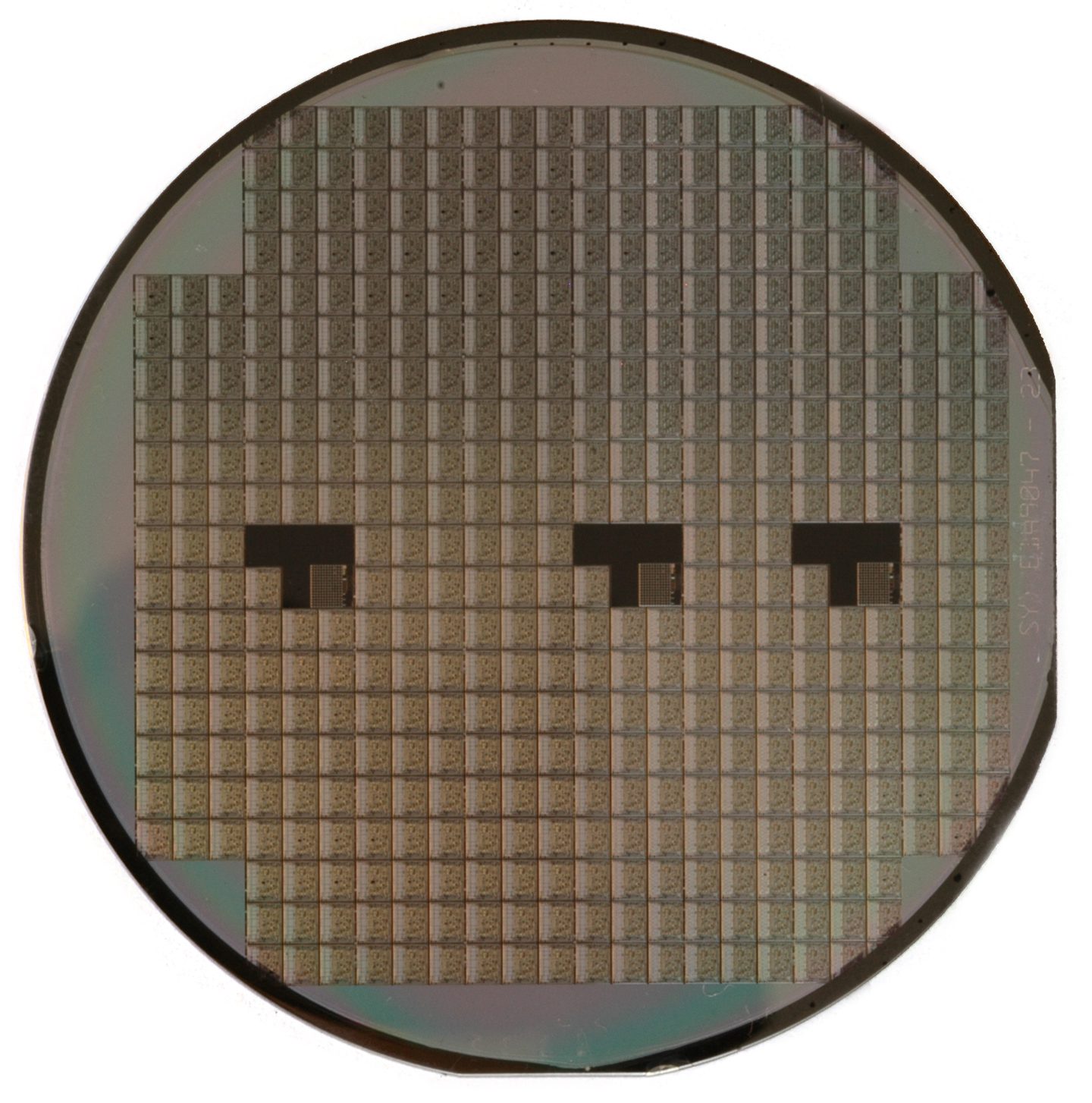 Round silicon semiconductor wafer etched with a grid of chip dies, the kind of hardware covered by AI chip export-control rules