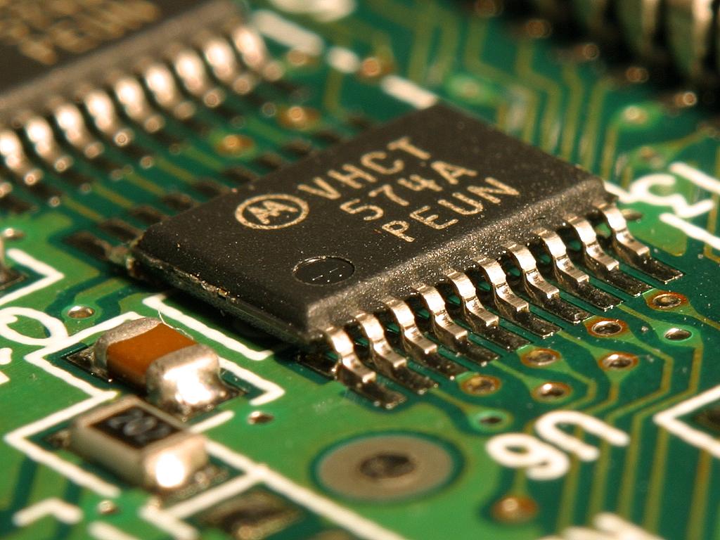 Close-up photo of an integrated circuit chip mounted on a circuit board
